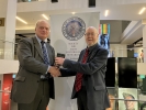 Dr John Peaty recognized for his longstanding service to the Society