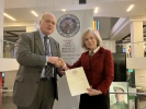 Dr Yolande Hodson is presented with her fellowship certificate